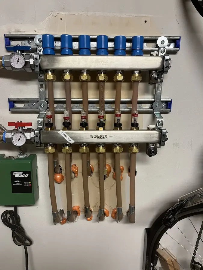 Plumber performing Water Heater Repair at a residential property in Raleigh Hills